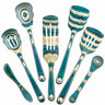 The Baltique® Mykonos Collection 7-Piece Cooking Utensil Set from Totally Bamboo includes two slotted spatulas, two spoons, a solid spatula, a small spoon, and a pasta server. Made with colored birch in teal, beige, and brown patterns, each piece has a shiny finish.